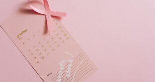 a pink calendar on pink surface