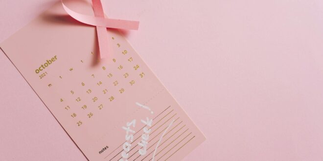 a pink calendar on pink surface